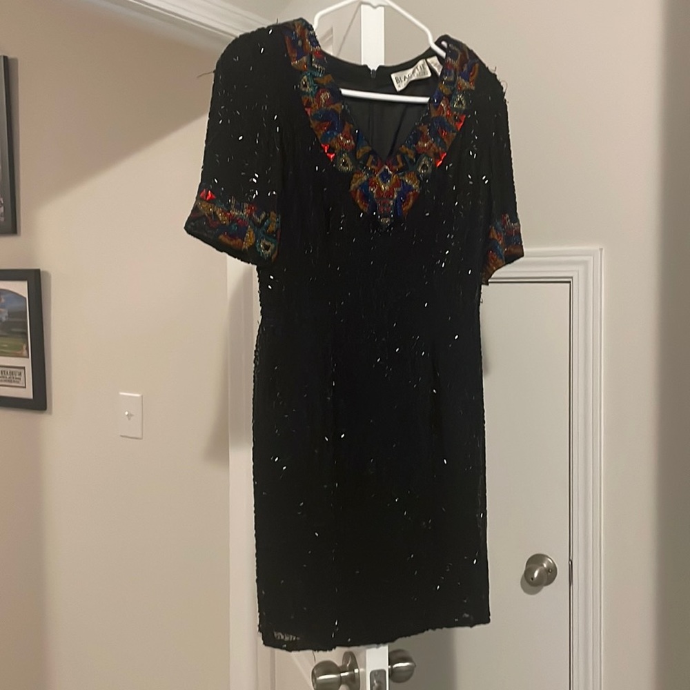 Oleg and Cassini Black Tie mini dress.